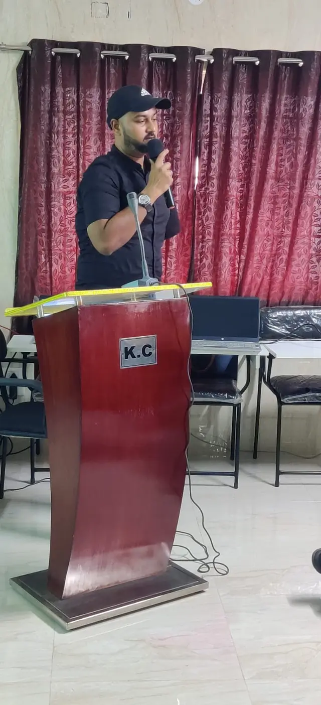 Speaker at the KC lectern