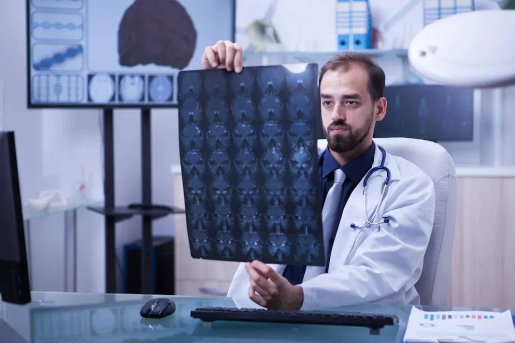 Neurologist reviewing a brain scan